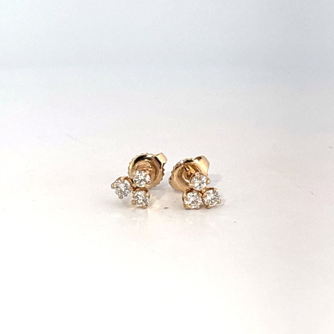 14K Yellow Gold Earrings set with 6 Round Brilliant Cut Diamonds totaling 0.18ct, E color.