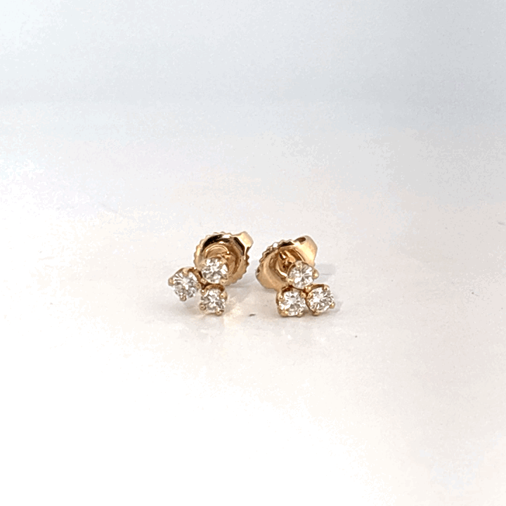 14K Yellow Gold Earrings set with 6 Round Brilliant Cut Diamonds totaling 0.18ct, E color.