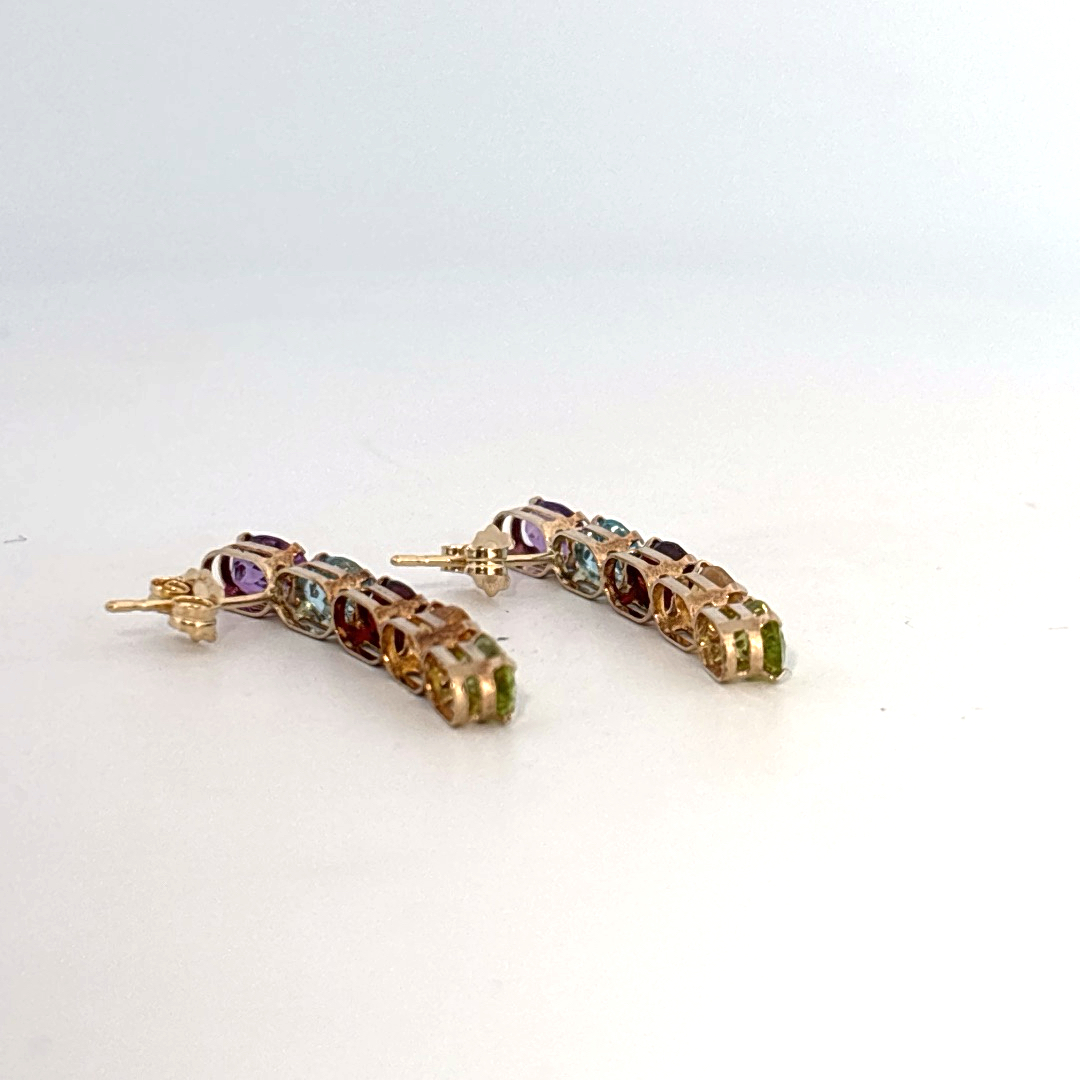 14K Yellow Gold Earrings, set with Oval Amethyst, Topaz, Garnet, Citrine, and Peridot gemstones.