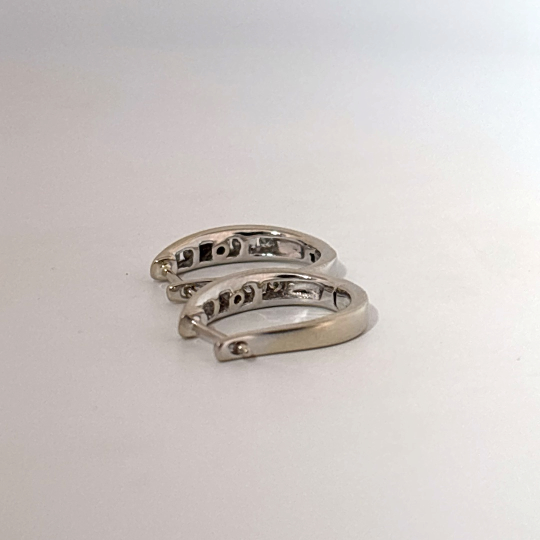10K White Gold Earrings, set with Channel-Set Round Diamonds, Female.