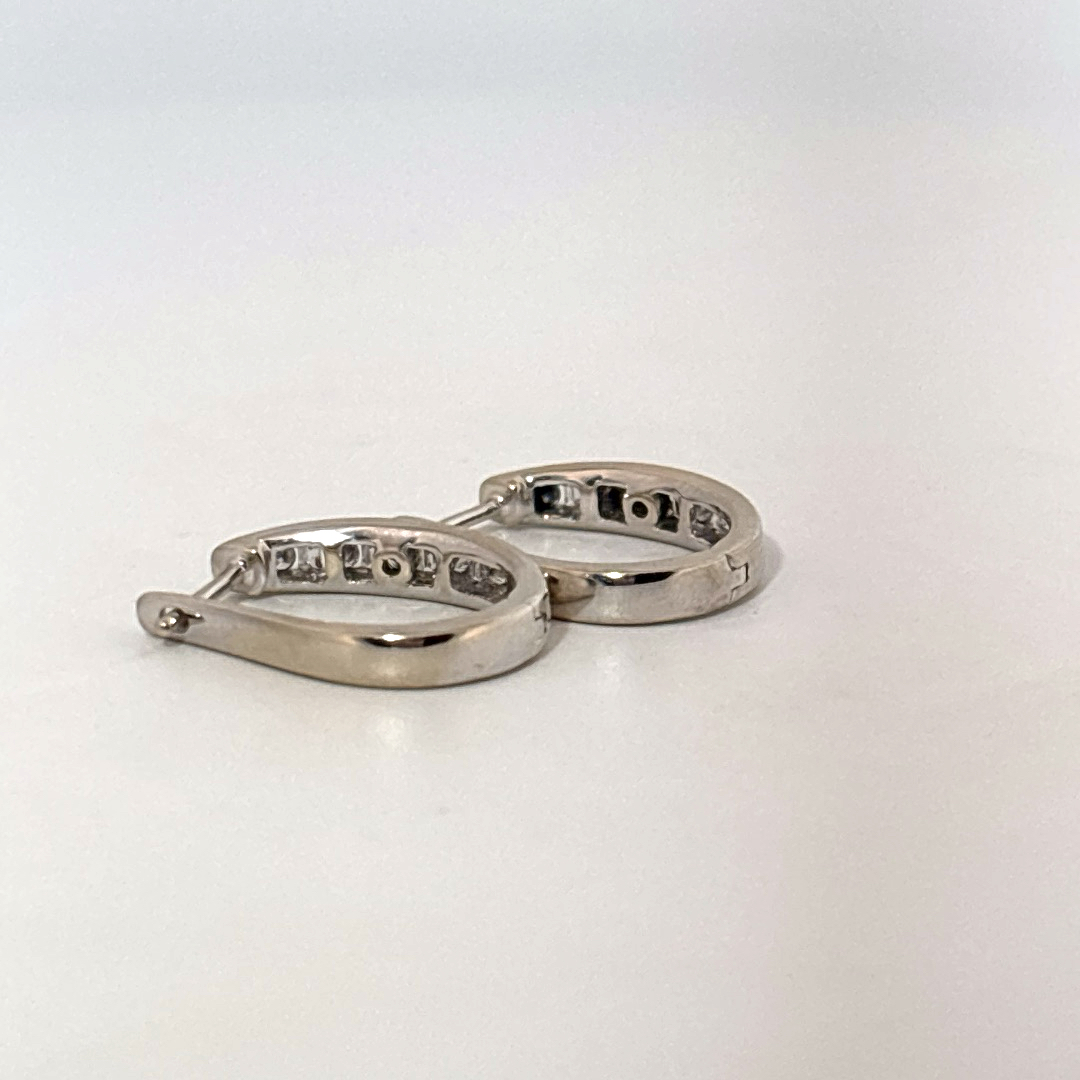 10K White Gold Earrings, set with Channel-Set Round Diamonds, Female.