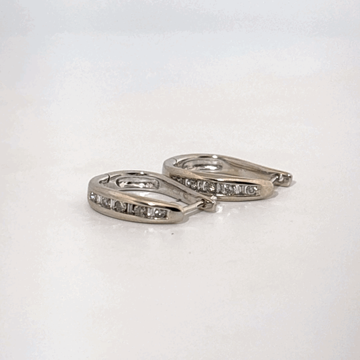 10K White Gold Earrings, set with Channel-Set Round Diamonds, Female.