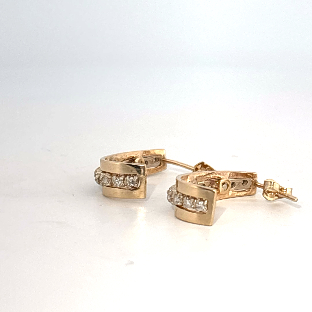 14K Yellow Gold Earrings, set with a row of small Round Diamonds.