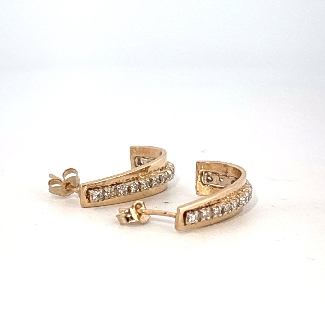 14K Yellow Gold Earrings, set with a row of small Round Diamonds.