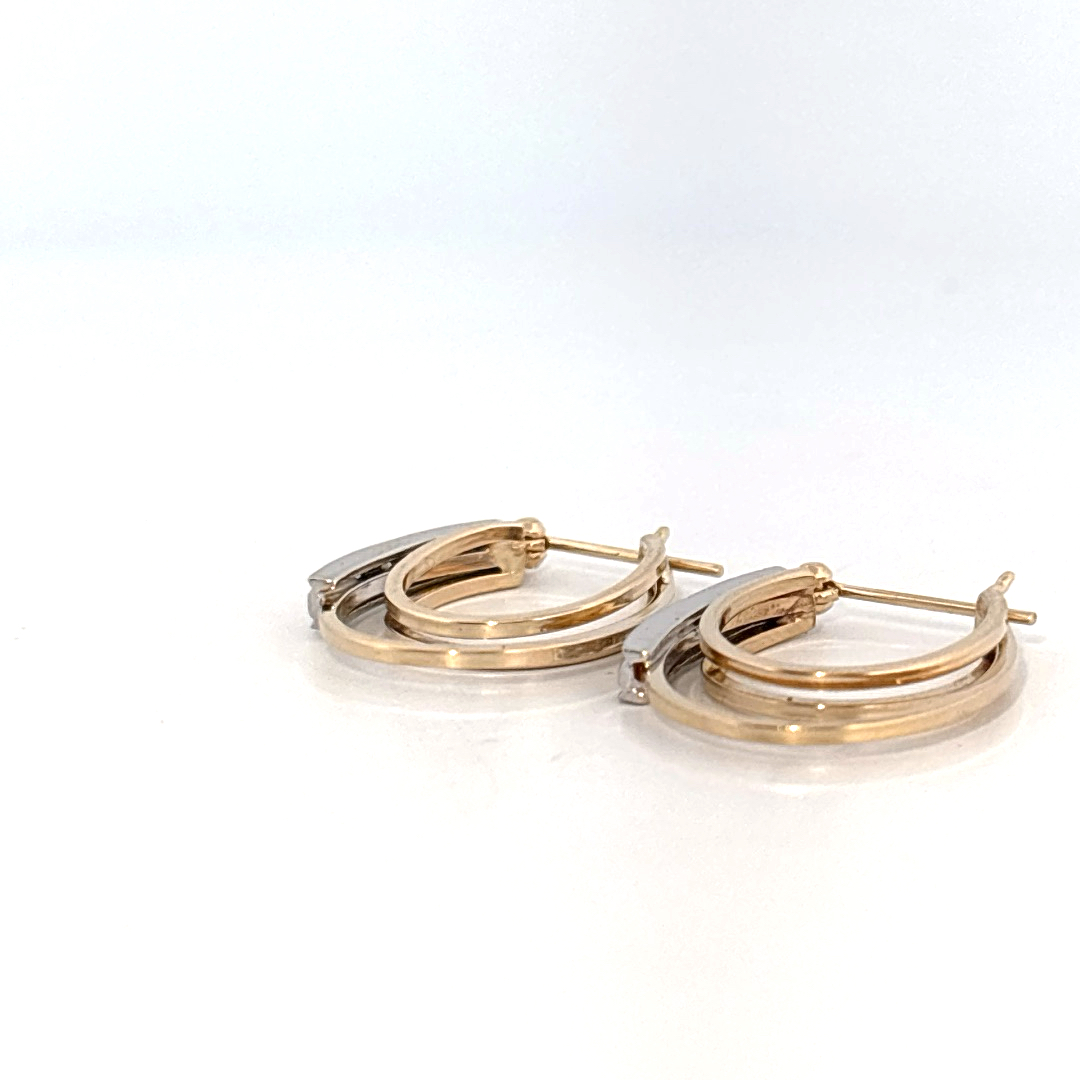 14K Dual White/Yellow Gold Earrings, set with Diamonds in a hinged hoop style.