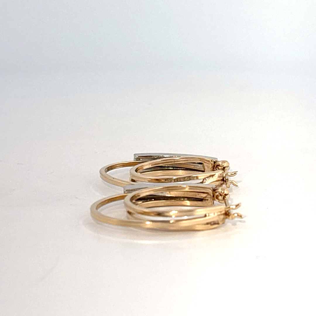 14K Dual White/Yellow Gold Earrings, set with Diamonds in a hinged hoop style.
