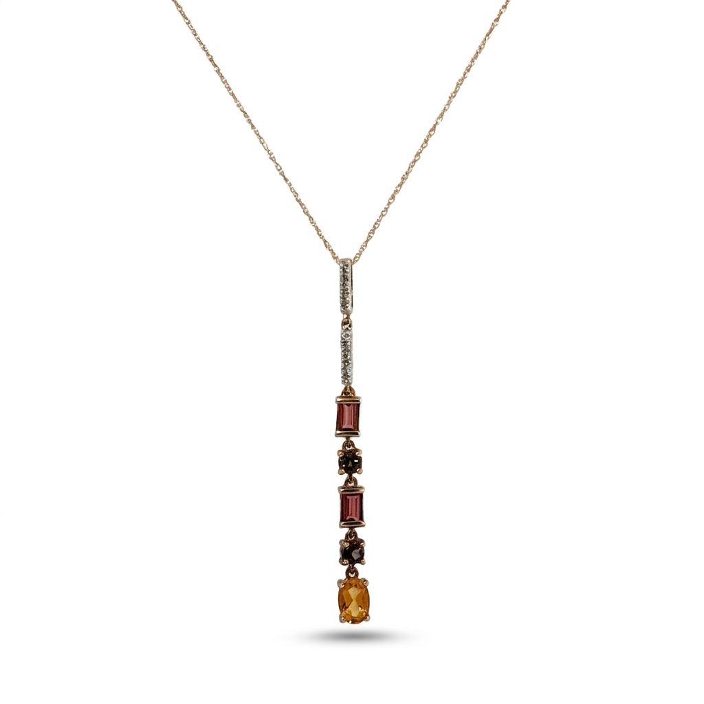 14K Yellow gold necklace with mixed color Citrines and white topaz in bale.