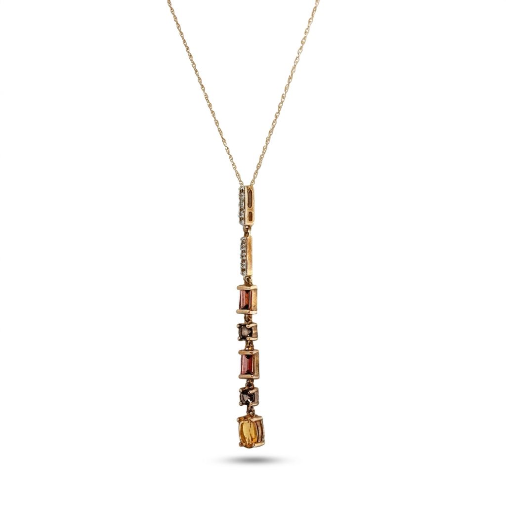 14K Yellow gold necklace with mixed color Citrines and white topaz in bale.