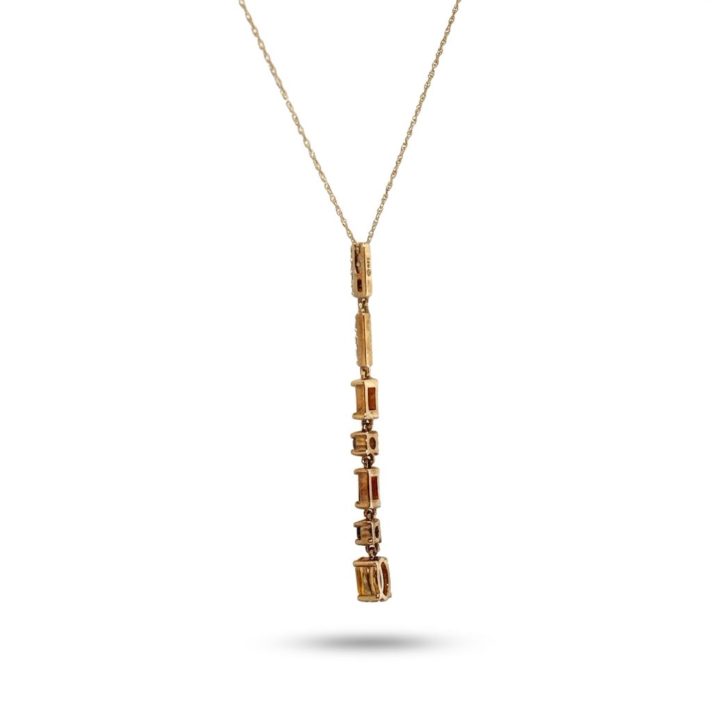 14K Yellow gold necklace with mixed color Citrines and white topaz in bale.