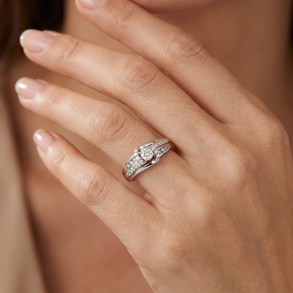 14K White Gold Engagement Ring, set with 1 Round Diamond (0.25ct, G, Slightly Included) and multiple smaller Diamonds (total 0.37ct), Size 7.