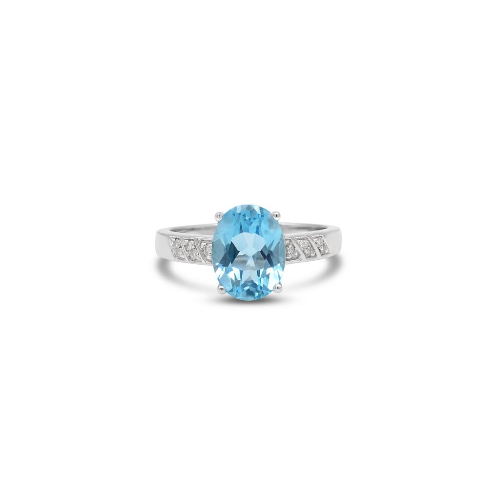 Ladies Ring, Natural Diamonds (0.03CTW) with Natural Blue Topaz 9x7mm, 10K White Gold