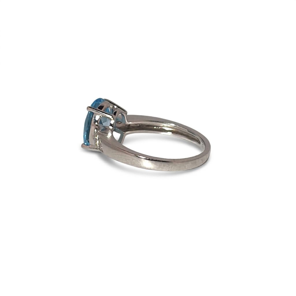 Ladies Ring, Natural Diamonds (0.03CTW) with Natural Blue Topaz 9x7mm, 10K White Gold