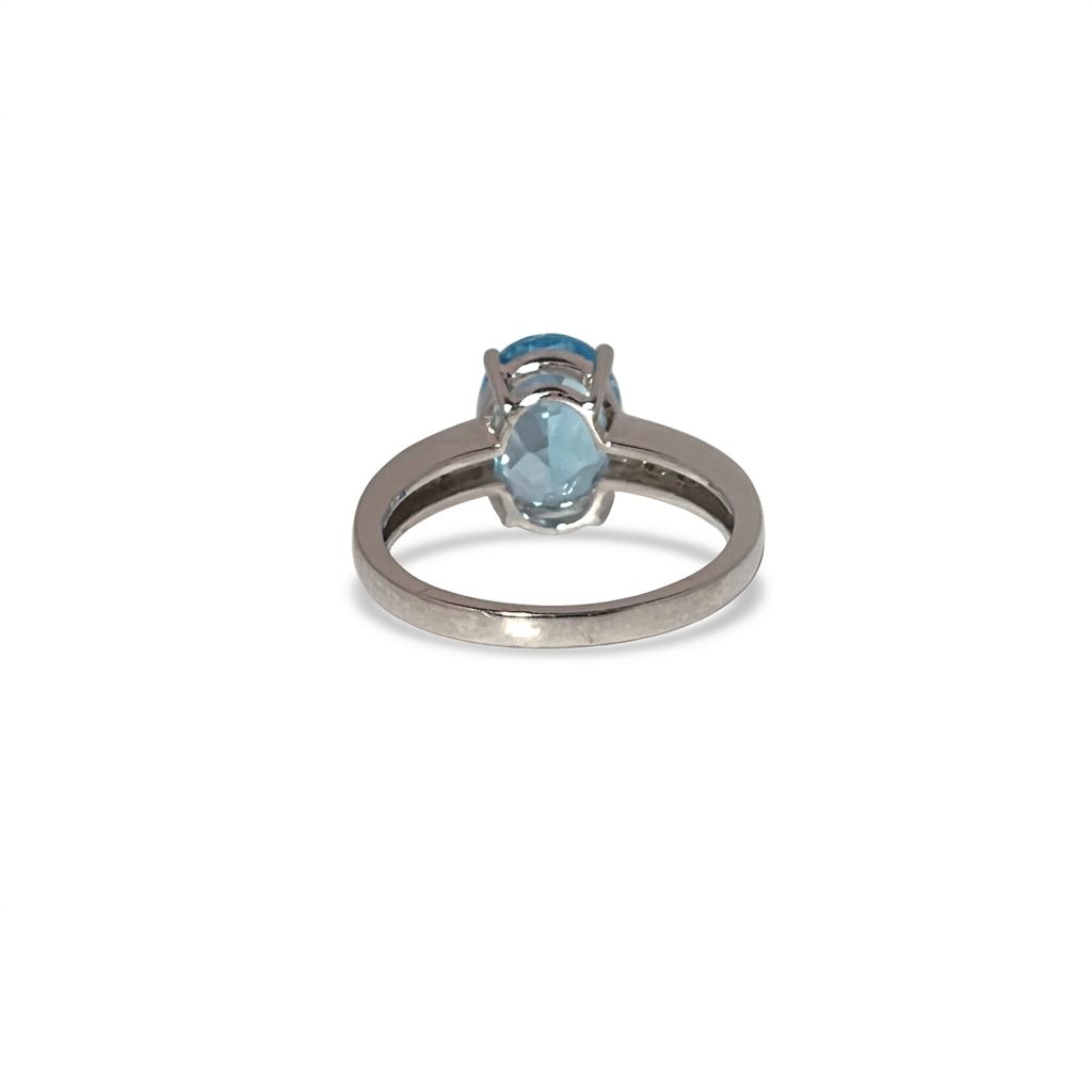 Ladies Ring, Natural Diamonds (0.03CTW) with Natural Blue Topaz 9x7mm, 10K White Gold