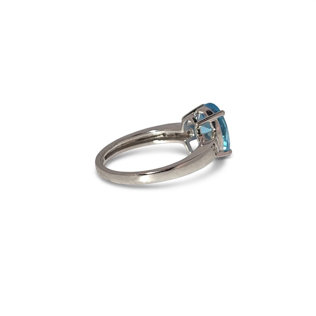Ladies Ring, Natural Diamonds (0.03CTW) with Natural Blue Topaz 9x7mm, 10K White Gold