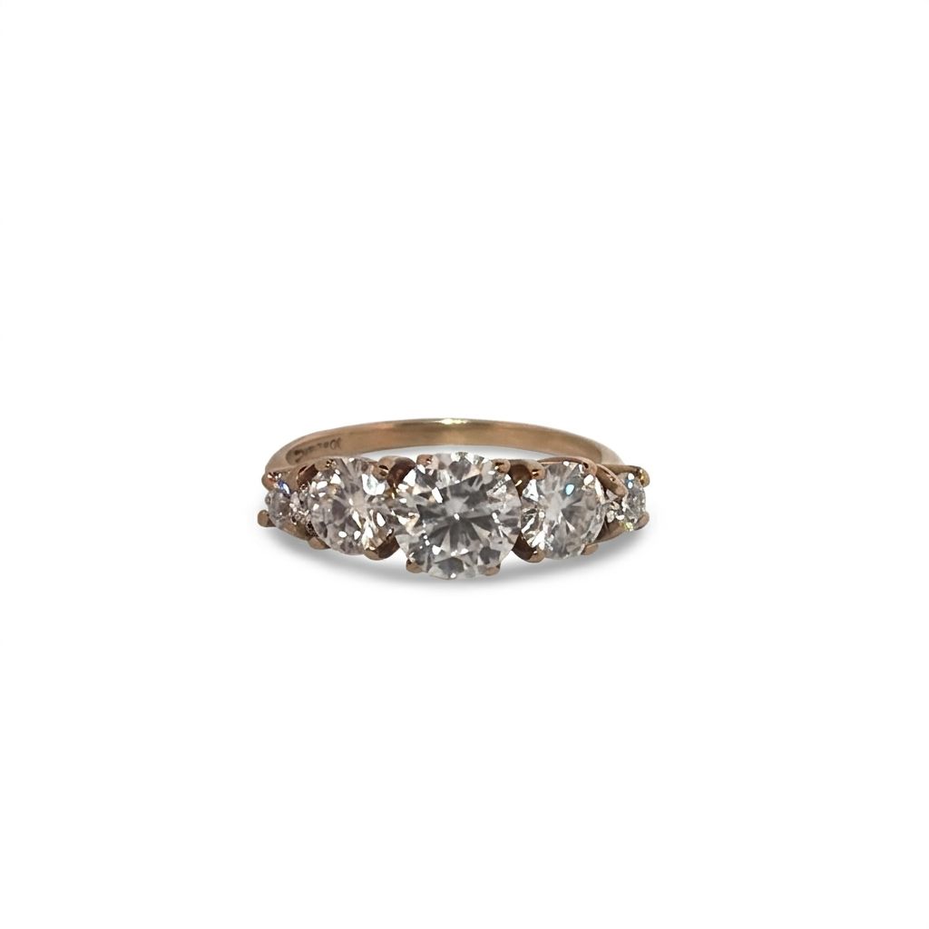 10K Yellow Gold Ring, set with 5 Moissanites, 2.6g, Size 6.