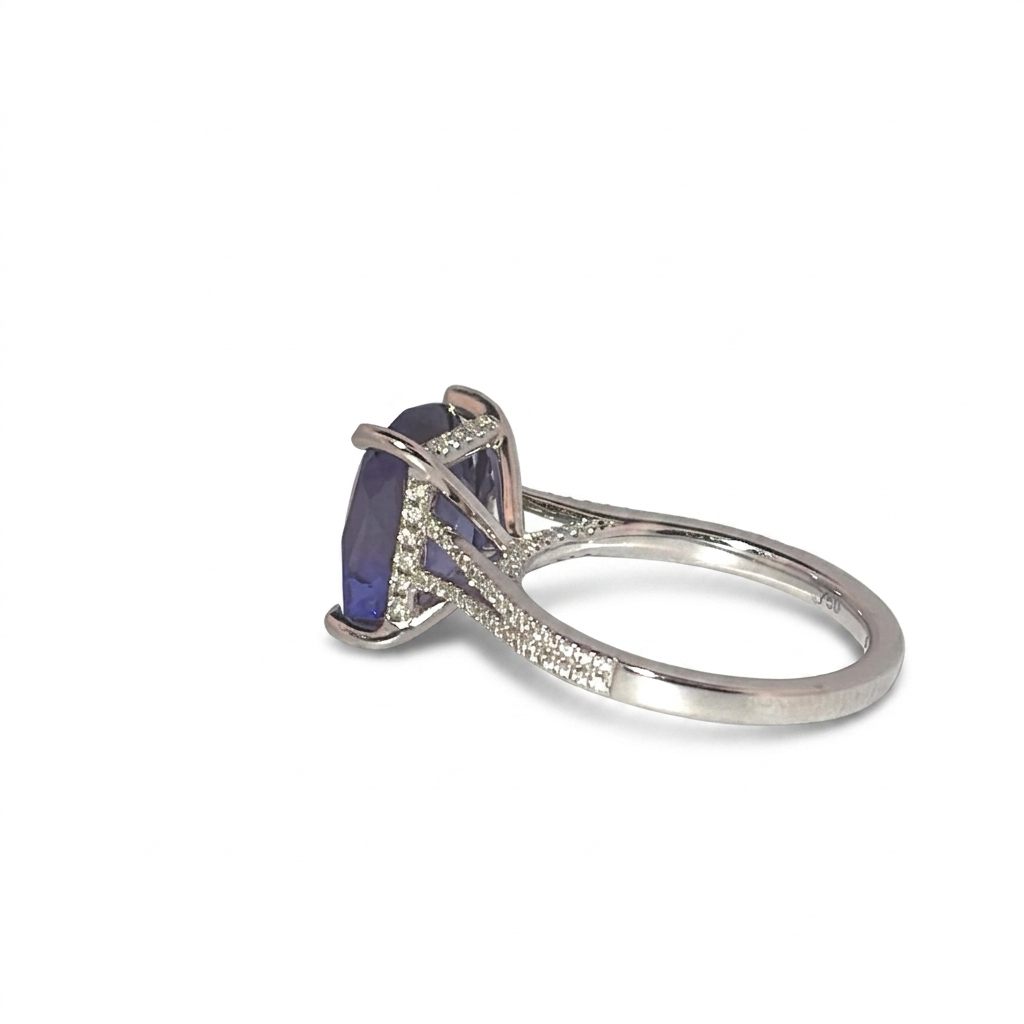 Modified Brilliant Cut, Cushion Shape, Bluish Violet Tanzanite 4.59CT (10.95 x 9.66 x 5.45 mm) with Natural Diamonds (0.31CT) Ring. GIA Certified (1232466558). 18K White Gold (4.80 GW)