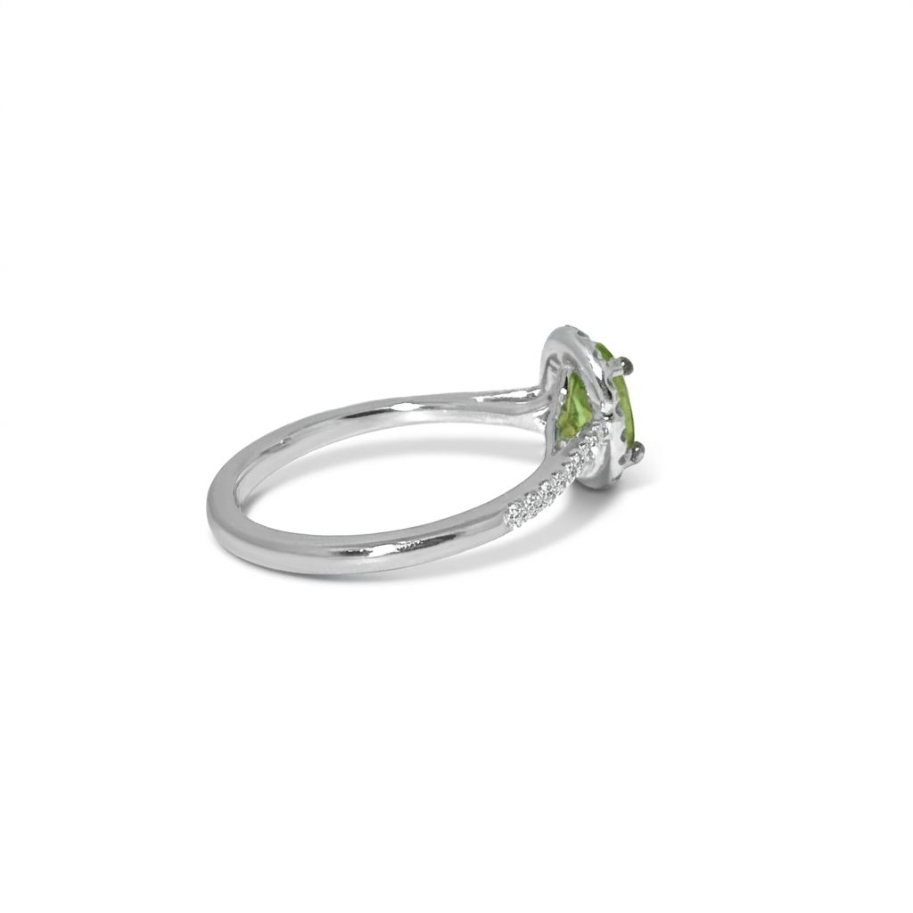 Modified Brilliant Cut, Oval Shape, Yellowish Green Tsavorite (0.84CT, 7.06 x 5.17 x 3.09 mm), Mounted on 14K White Gold with Natural Diamonds (0.33CTW). GIA Certified (6237467057). Size 6.50