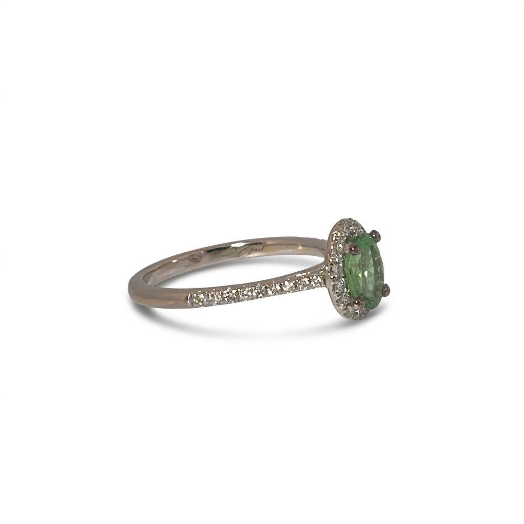 Modified Brilliant Cut, Oval Shape, Yellowish Green Tsavorite (0.84CT, 7.06 x 5.17 x 3.09 mm), Mounted on 14K White Gold with Natural Diamonds (0.33CTW). GIA Certified (6237467057). Size 6.50