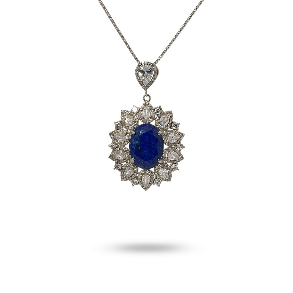 Sterling Silver Necklace, set with 1 Oval Lapis Lazuli and surrounded by multiple Clear Pear-shaped stones.