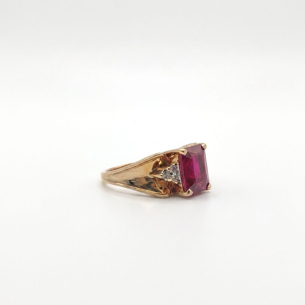 Center Ruby (10x8mm 4.25CT)  ,6 x Natural Diamonds (0.03CTW), 10K Yellow Gold