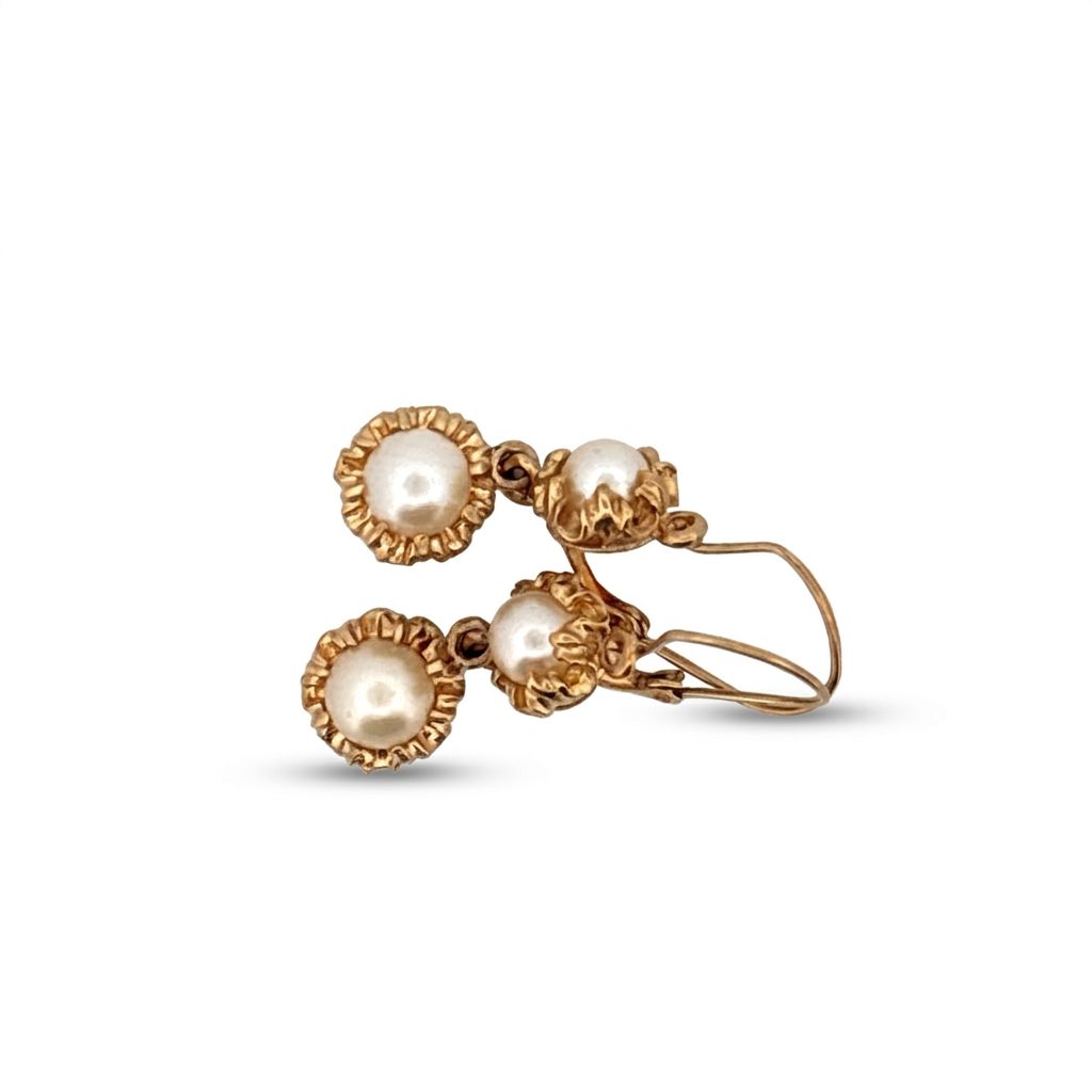 Female Earrings, 14K Yellow Gold, featuring four white Pearls in two-drop design settings.