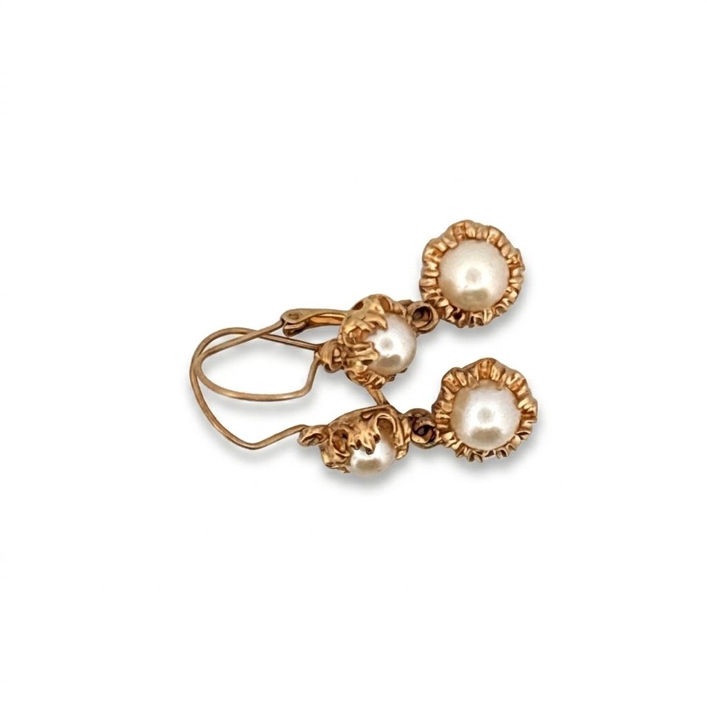 Female Earrings, 14K Yellow Gold, featuring four white Pearls in two-drop design settings.