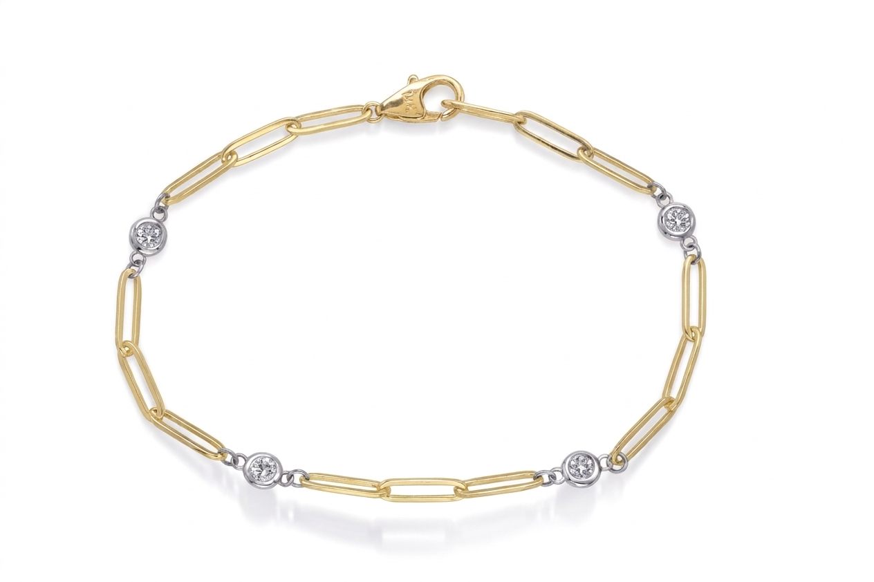 14K Yellow Gold Female Bracelet with 0.20ct Diamonds, mixed metal accents, lobster clasp closure.