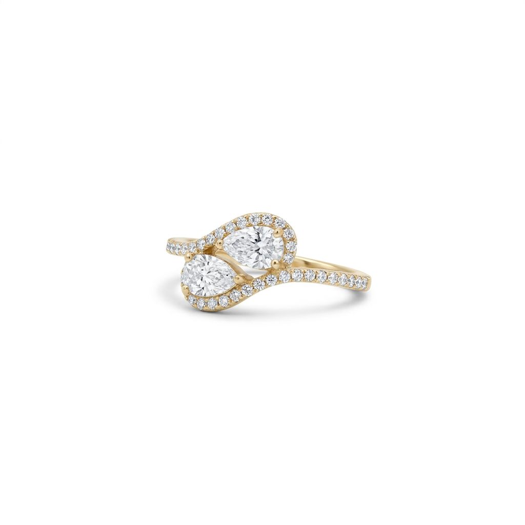 14K Yellow Gold Ring, set with 2 Pear Lab Grown Diamonds (0.70ct, D, VVS1) and 40 Round Lab Grown Diamonds (0.25ct total, E-F, VVS1), 2.74g.