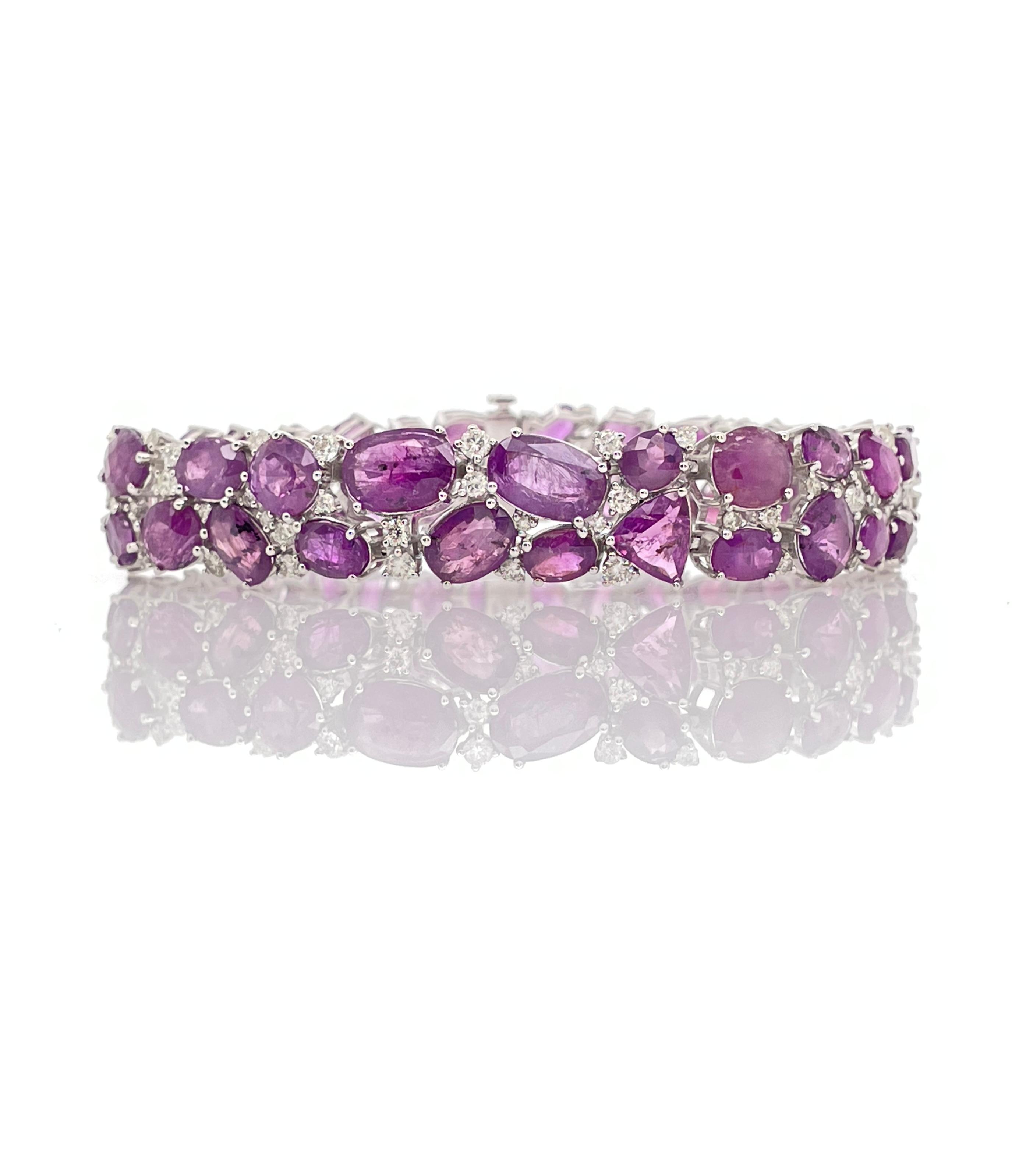 A Collectible Piece with 53 Extremely rare Kashmir Genuine unheated Sapphires (45.12 CT) with 112 round G Color VS2 Diamonds, Female Bracelet made by Oscar Friedman.