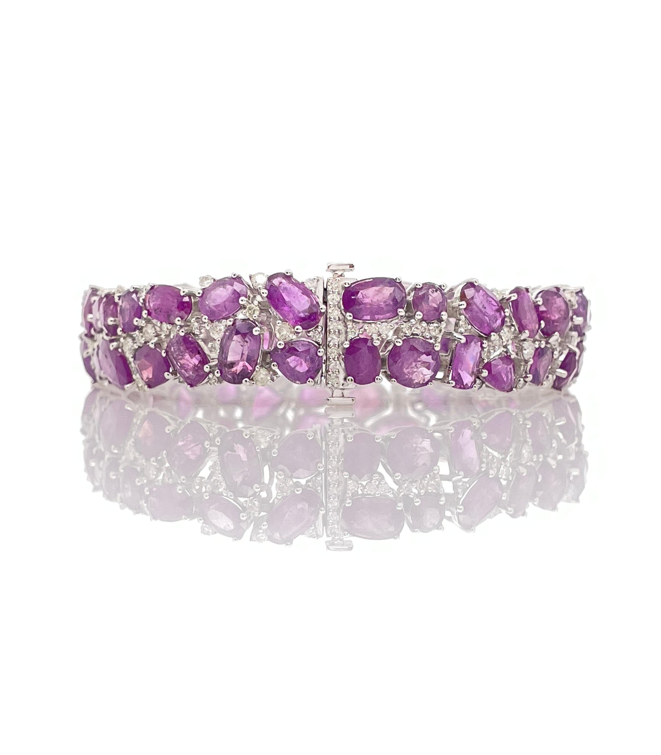 A Collectible Piece with 53 Extremely rare Kashmir Genuine unheated Sapphires (45.12 CT) with 112 round G Color VS2 Diamonds, Female Bracelet made by Oscar Friedman.