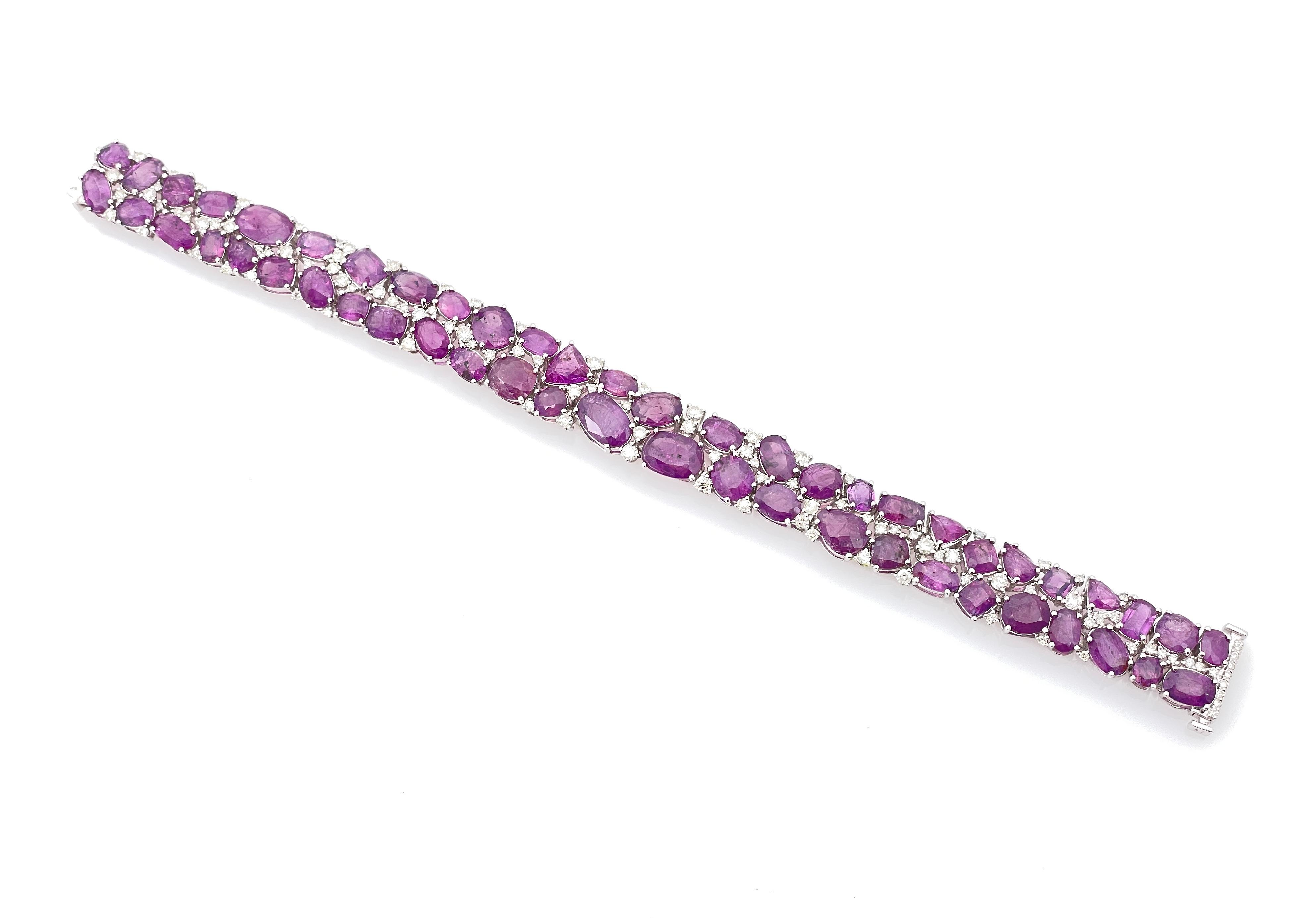 A Collectible Piece with 53 Extremely rare Kashmir Genuine unheated Sapphires (45.12 CT) with 112 round G Color VS2 Diamonds, Female Bracelet made by Oscar Friedman.