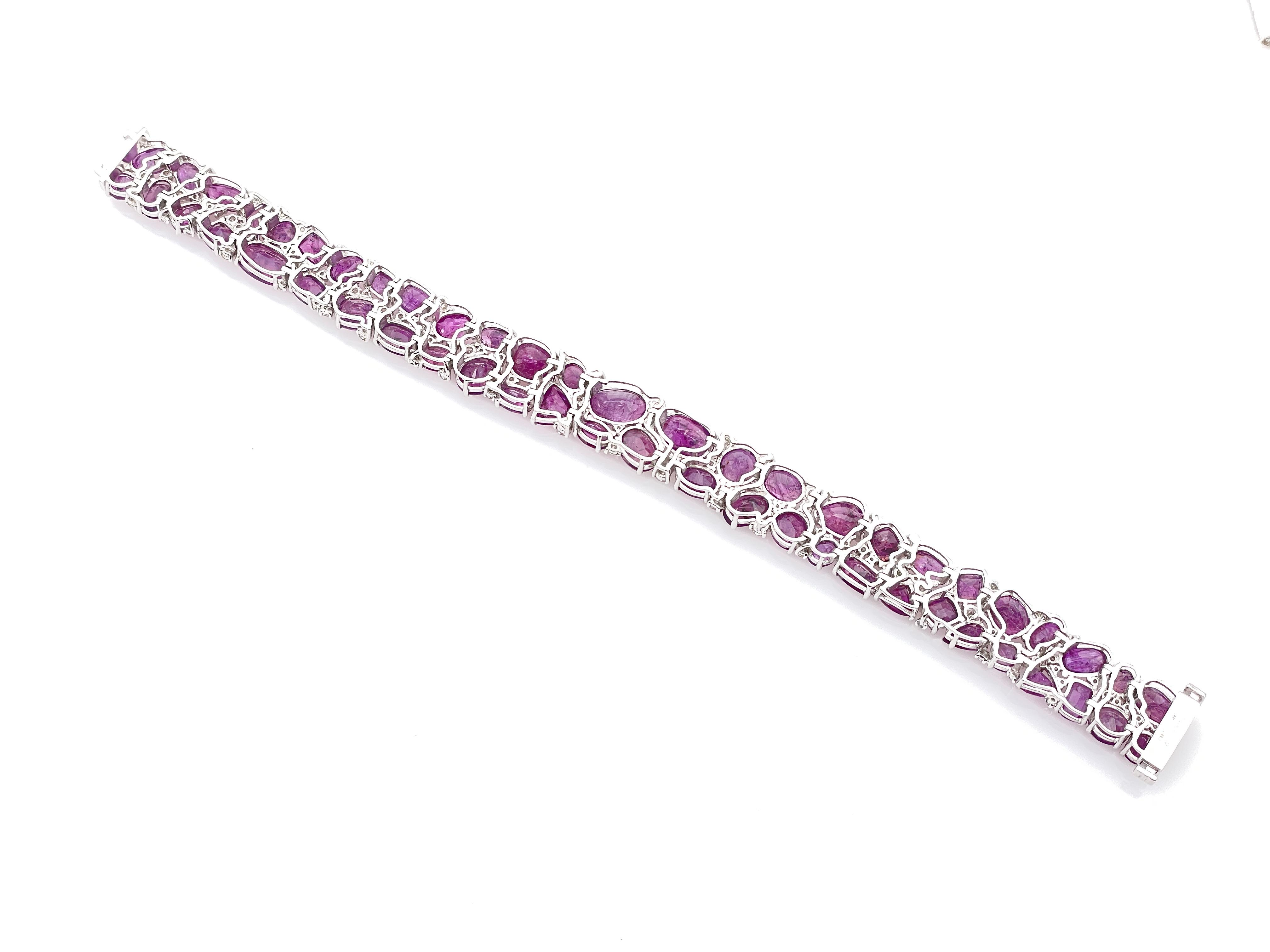 A Collectible Piece with 53 Extremely rare Kashmir Genuine unheated Sapphires (45.12 CT) with 112 round G Color VS2 Diamonds, Female Bracelet made by Oscar Friedman.