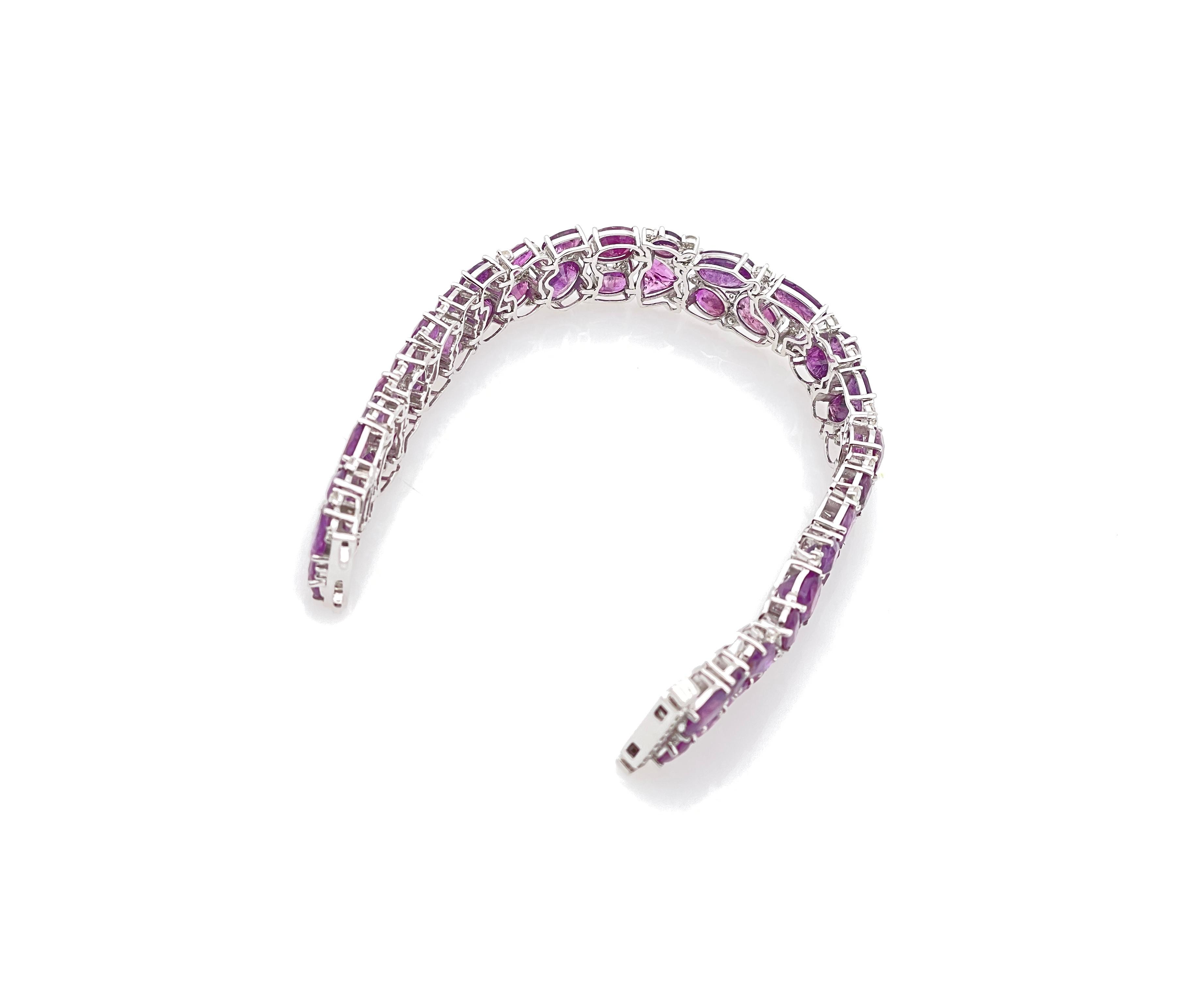 A Collectible Piece with 53 Extremely rare Kashmir Genuine unheated Sapphires (45.12 CT) with 112 round G Color VS2 Diamonds, Female Bracelet made by Oscar Friedman.