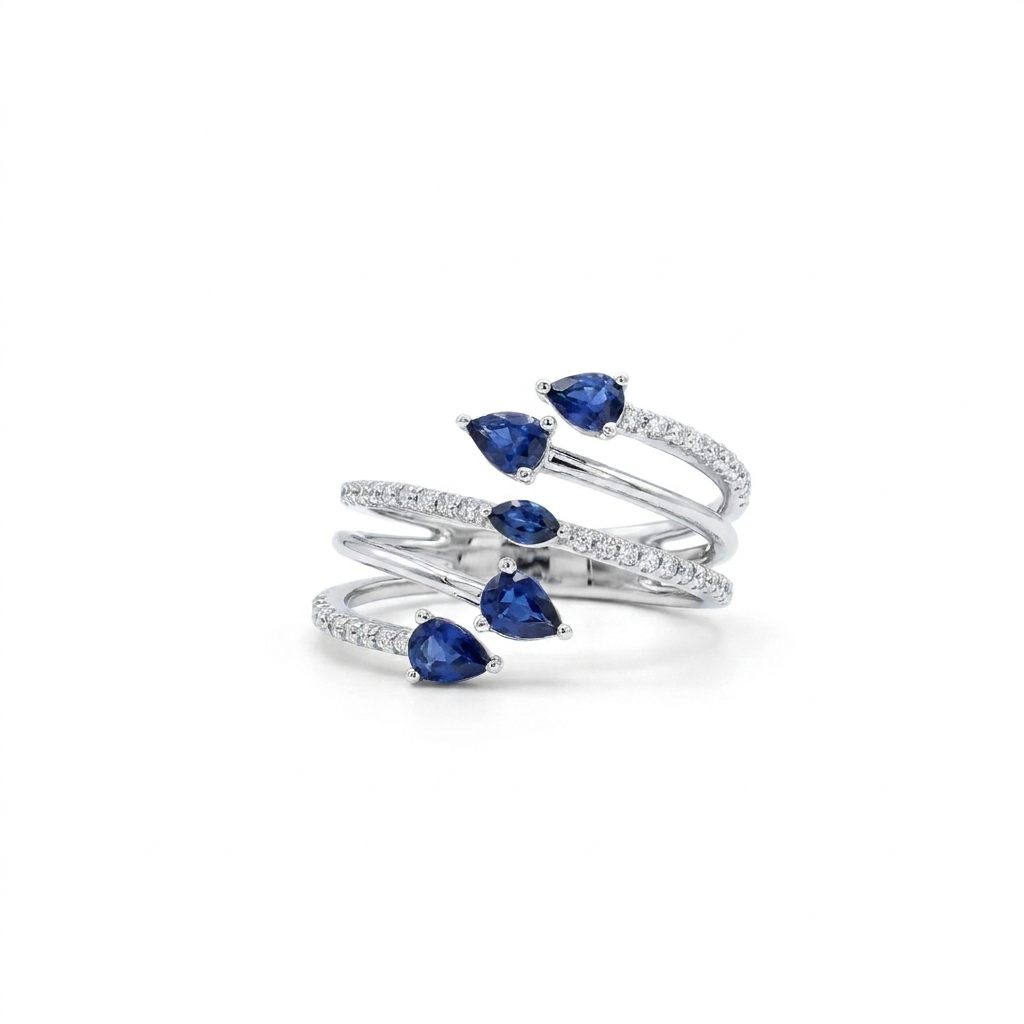 14K White Gold Female Ring, Size 7, set with 5 Pear-Shape Blue Sapphires (1ct total, Eye Clean) and 42 Round Diamonds (0.3ct total, E, VS1) in a spiral design.