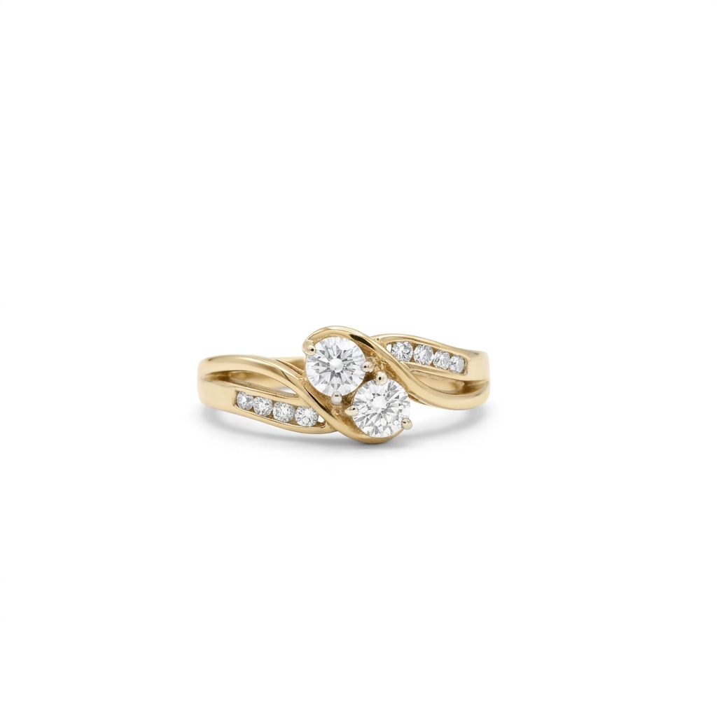 10K Yellow Gold Engagement Ring, set with 2 Round Diamonds (0.65ct, G, SI1) and 8 Round Diamonds (0.10ct total)