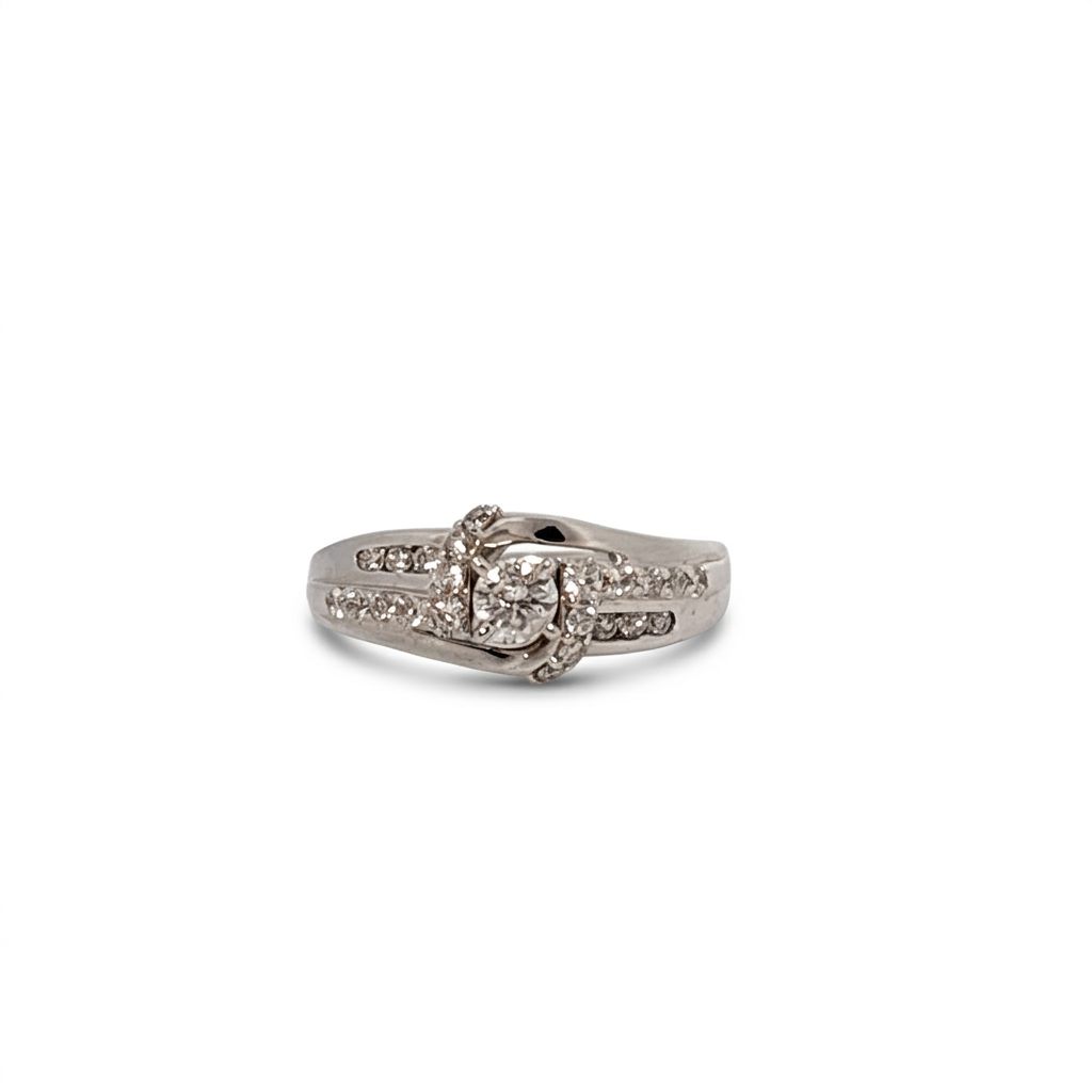 14K White Gold Engagement Ring, set with 1 Round Diamond (0.25ct, G, Slightly Included) and multiple smaller Diamonds (total 0.37ct), Size 7.