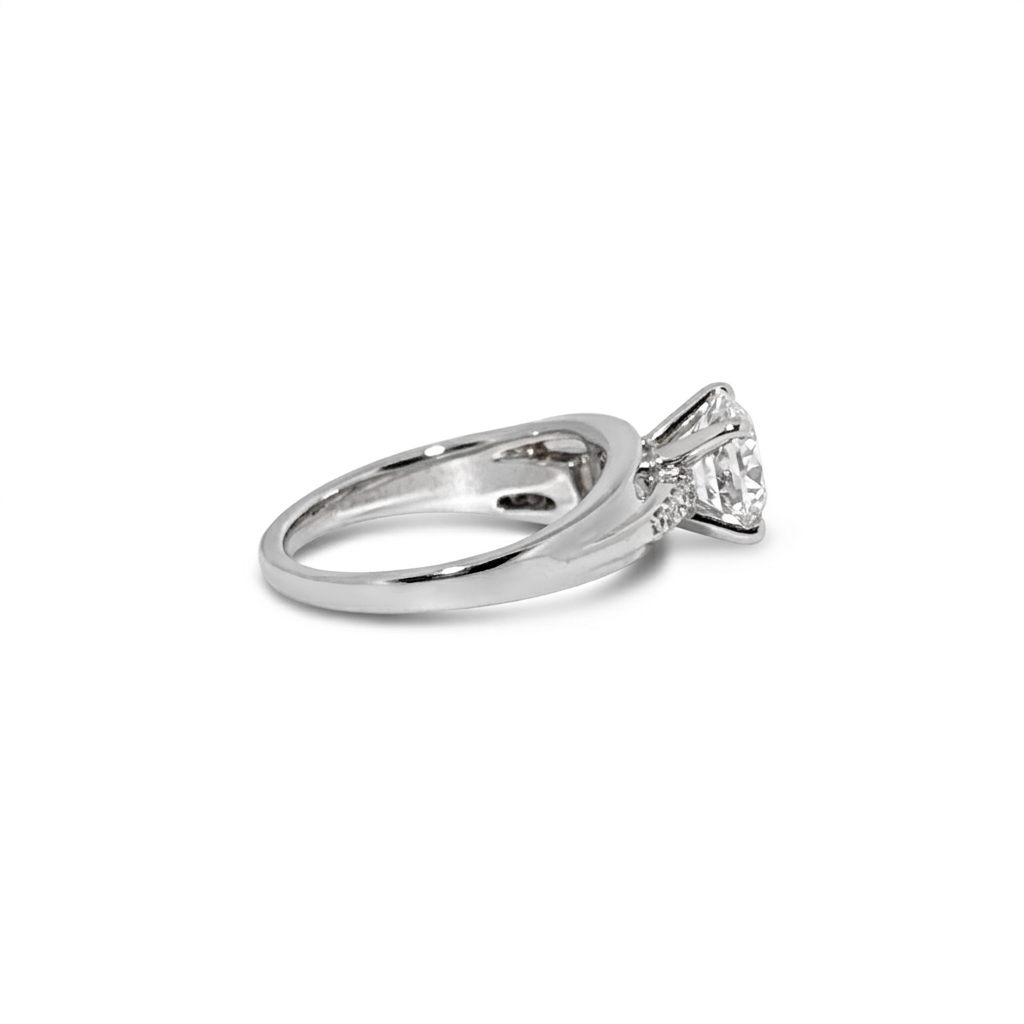 14K White Gold Engagement Ring, set with 1 Round Diamond (0.25ct, G, Slightly Included) and multiple smaller Diamonds (total 0.37ct), Size 7.