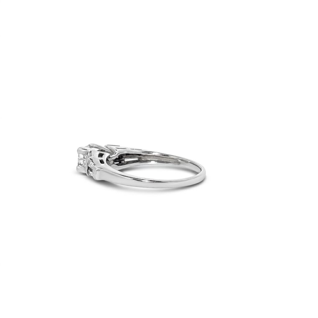 14K White Gold Engagement Ring, set with 1 Princess Diamond (0.50ct, H, VS2) and 12 Baguette Diamonds (0.25ct total, H, VS2), Size 8.00.