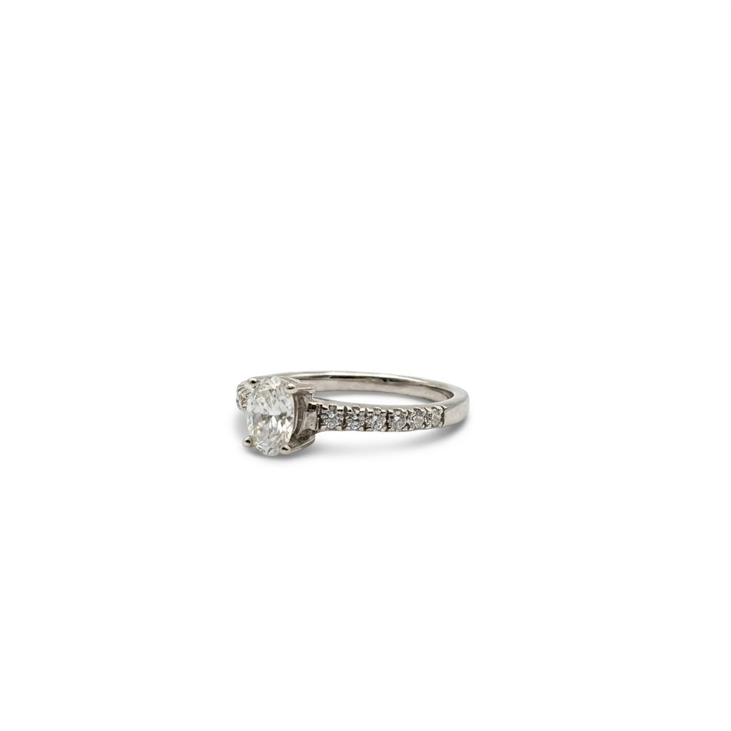 14K White Gold Engagement Ring, set with 1 Oval Diamond (0.52ct, E, SI) and 12 Round Diamonds (total 0.25ct)