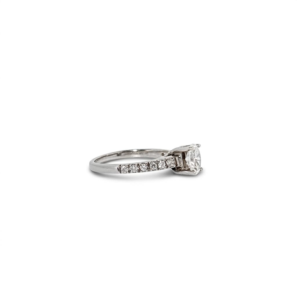 14K White Gold Engagement Ring, set with 1 Oval Diamond (0.52ct, E, SI) and 12 Round Diamonds (total 0.25ct)